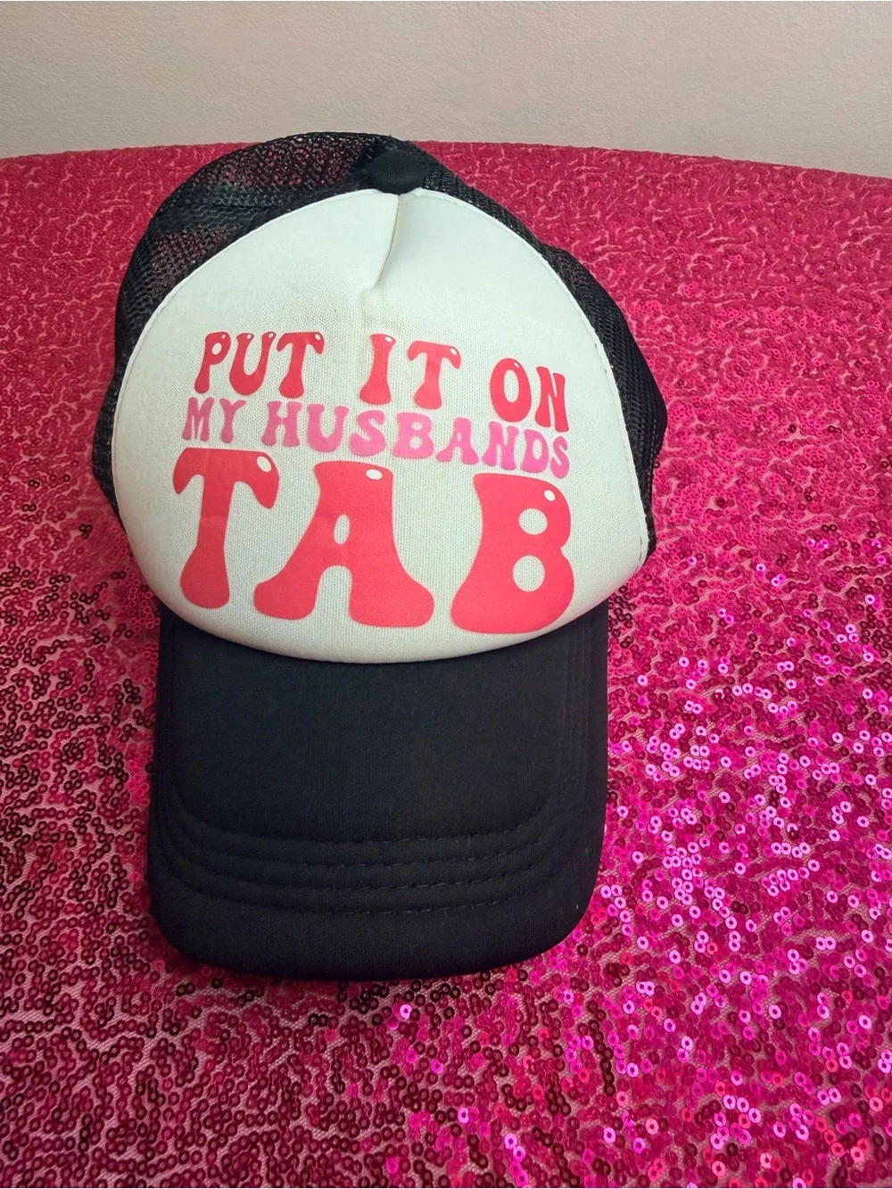 Put It On My Husband's Tab Pink & Black Trucker Hat